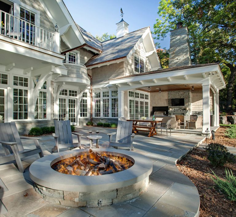 Builder: John Kraemer & Sons | Architect: Swan Architecture | Interiors: Katie Redpath Constable | Landscaping: Bechler Landscapes | Photography: Landmark Photography by John Kraemer & Sons | Outdoor Photos | Porch | Landscaping | Landscape Design | Outdoor Living Space | Porch Design Ideas | Outdoor Living Space Ideas | Backyard Design