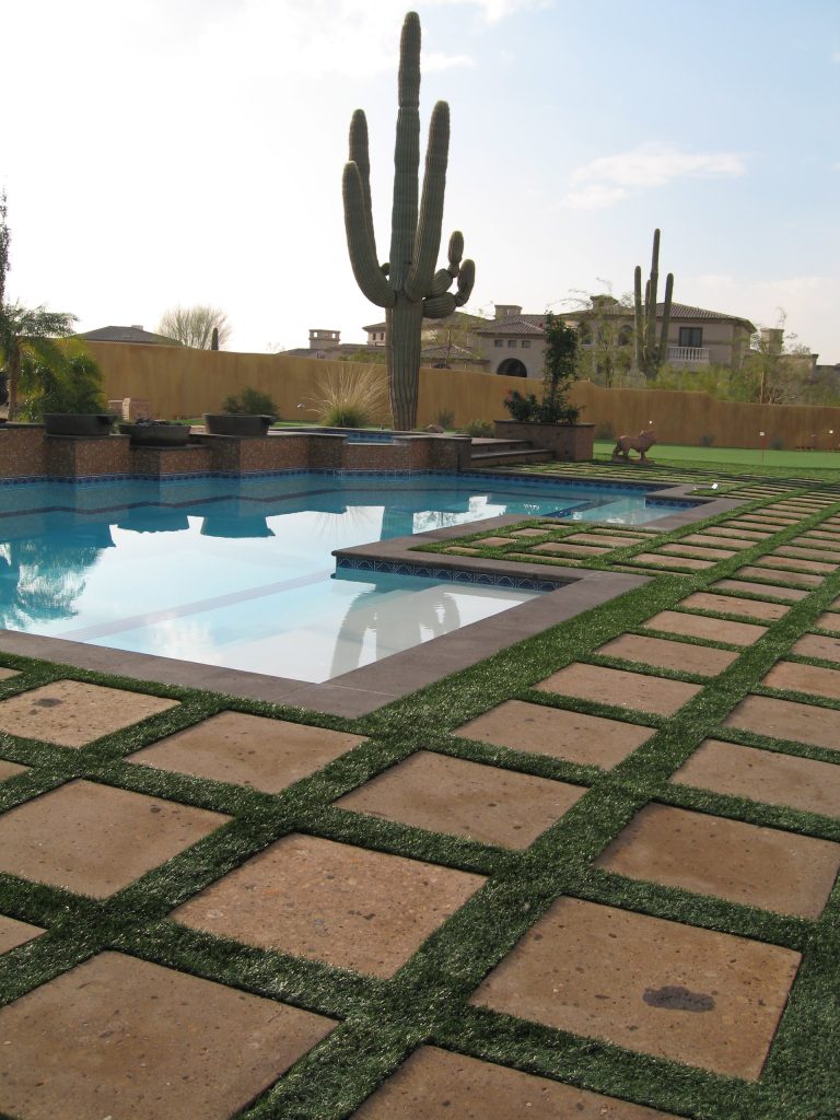 Cantera Pavers Pool Coping Cantera has been sealed and enhanced.