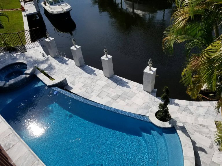 Carrera White Marble Pool Deck Pavers in French Pattern. Non-Slip Texture