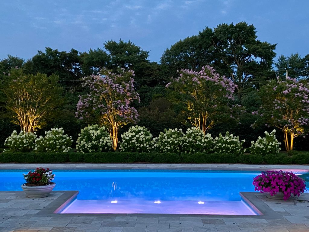 Circa 2021. This stunning garden is in New Jersey and one knows it's not Houston because of the hydrangeas. Can you say staycation? Pool landscaping - huge traditional backyard stone and custom-shaped lap pool landscaping idea in Houston by David Morello Garden Enterprises, Inc. | Pool design | Pool Contracting | Swimming Pool Ideas | Swimming Pool Design Ideas