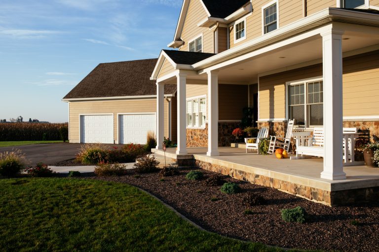 Classic concrete front porch idea in Indianapolis with a roof extension by Zager Architecture | Outdoor Photos | Porch | Landscaping | Landscape Design | Outdoor Living Space | Porch Design Ideas | Outdoor Living Space Ideas | Backyard Design