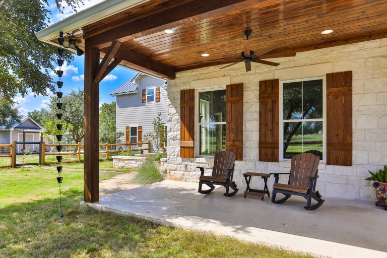 Classic ranch home exterior with a farmhouse flair. This beautiful home has all the views of the Texas hill country along with all the amenities a ranch home could need. by BCI Custom Homes | Outdoor Photos | Porch | Landscaping | Landscape Design | Outdoor Living Space | Porch Design Ideas | Outdoor Living Space Ideas | Backyard Design