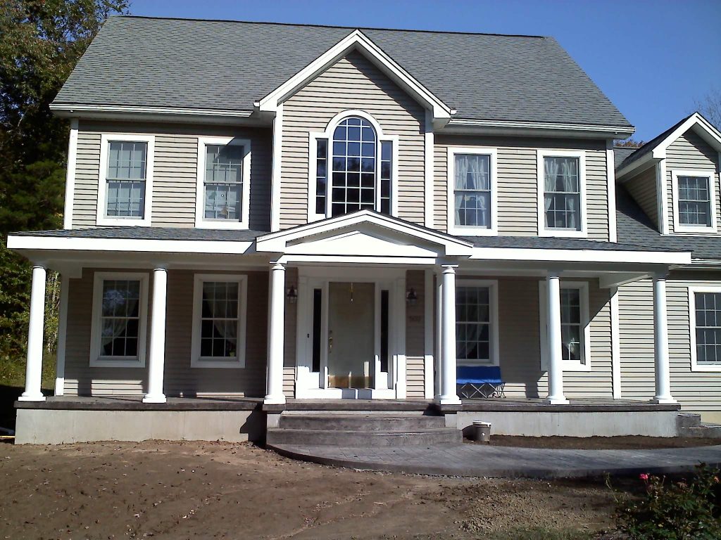 Classic stamped concrete front porch idea in Bridgeport with a roof extension by Select Construction, LLC | Outdoor Photos | Porch | Landscaping | Landscape Design | Outdoor Living Space | Porch Design Ideas | Outdoor Living Space Ideas | Backyard Design
