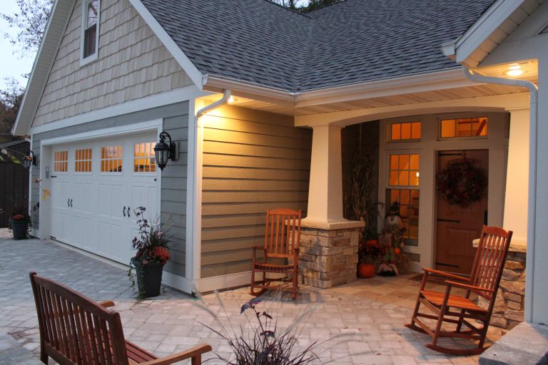 Classic stone front porch idea in Other by Christel & Heiberger Builders, Inc. | Outdoor Photos | Porch | Landscaping | Landscape Design | Outdoor Living Space | Porch Design Ideas | Outdoor Living Space Ideas | Backyard Design