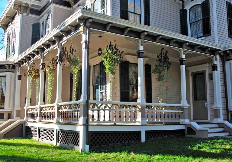 Complete renovation and restoration of decorative Victorian wood porch