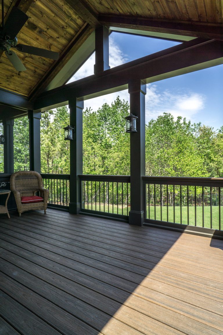 Composite Deck with Trex Transcend Spiced Rum and Screened-in Porch. Built by Decksouth.