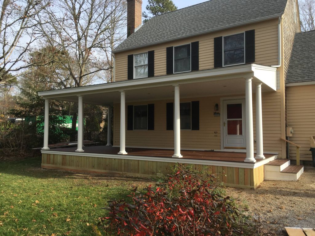 Contemporary Farmer's Porch Addition with tapered colonial columns