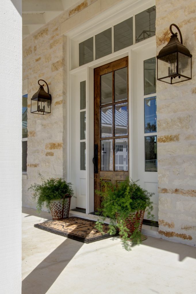 Cottage concrete front porch idea in Austin with a roof extension by Parker Homes | Outdoor Photos | Porch | Landscaping | Landscape Design | Outdoor Living Space | Porch Design Ideas | Outdoor Living Space Ideas | Backyard Design