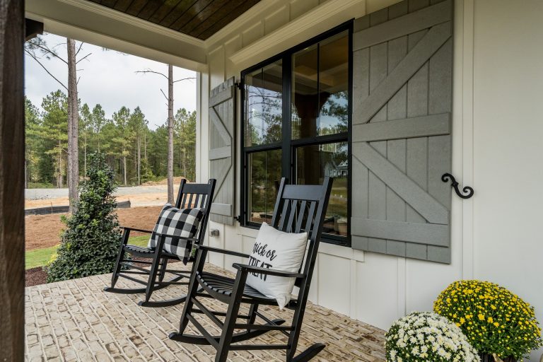 Country brick front porch photo in Raleigh by Poythress Construction Company Inc. | Outdoor Photos | Porch | Landscaping | Landscape Design | Outdoor Living Space | Porch Design Ideas | Outdoor Living Space Ideas | Backyard Design