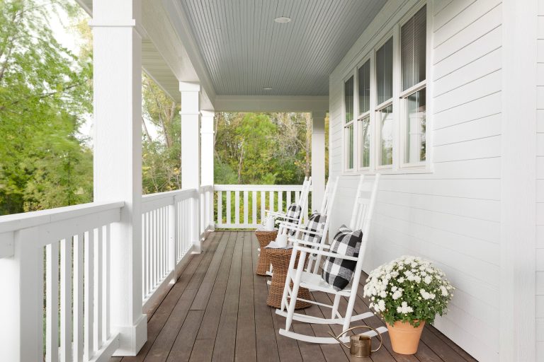 Country porch photo in Minneapolis by Bria Hammel Interiors | Outdoor Photos | Porch | Landscaping | Landscape Design | Outdoor Living Space | Porch Design Ideas | Outdoor Living Space Ideas | Backyard Design