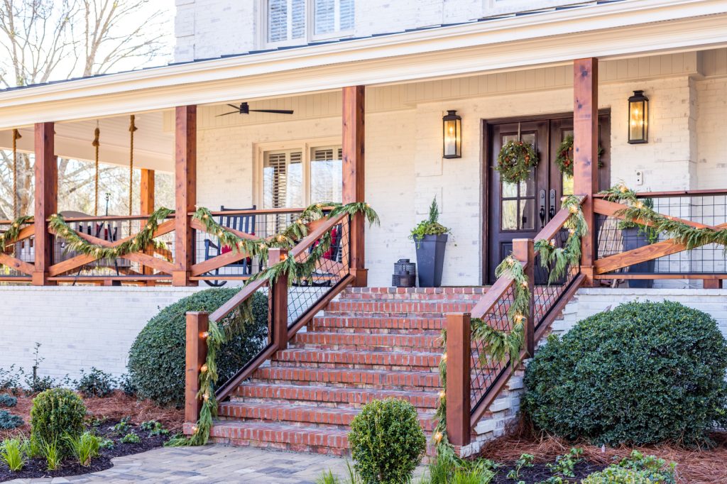 Country porch photo in Other by Sun Windows and Doors | Outdoor Photos | Porch | Landscaping | Landscape Design | Outdoor Living Space | Porch Design Ideas | Outdoor Living Space Ideas | Backyard Design