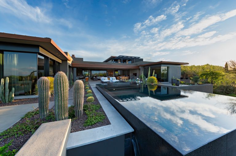 Beautiful Black Water Pool and stunning outdoor patio. Builder - Madison/Couturier, Interiors by Sherry Engle - SE Design, photo by Thompson Photographic.