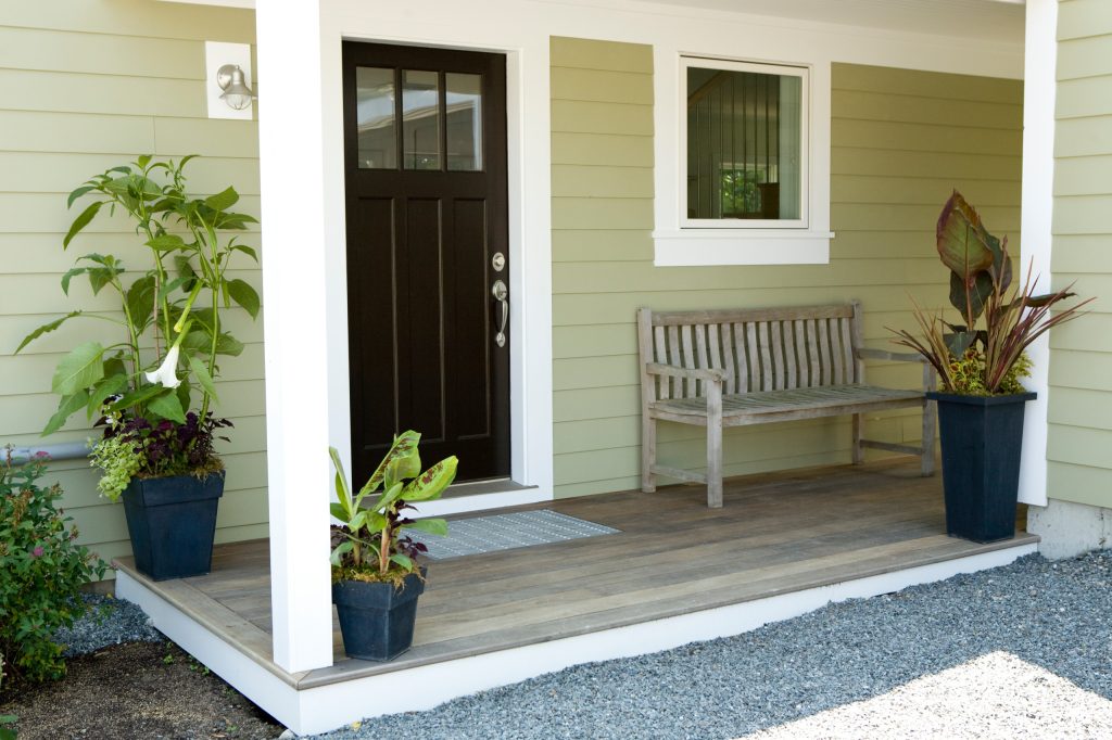 Covered entry porch and garage connector