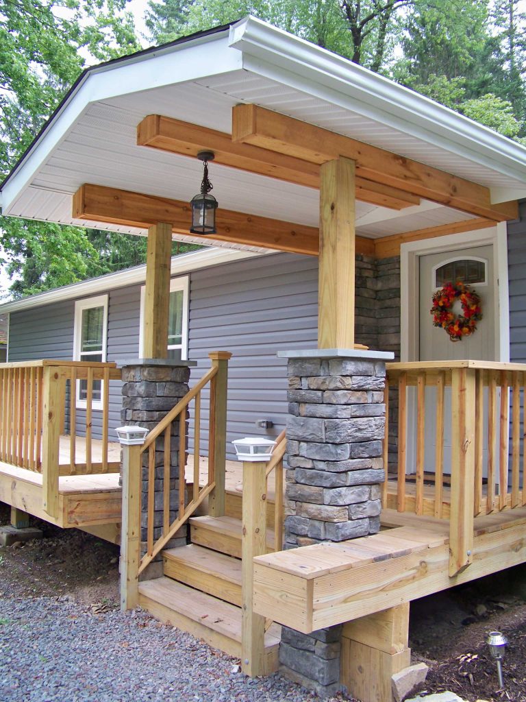 Covered front entrance with new deck.