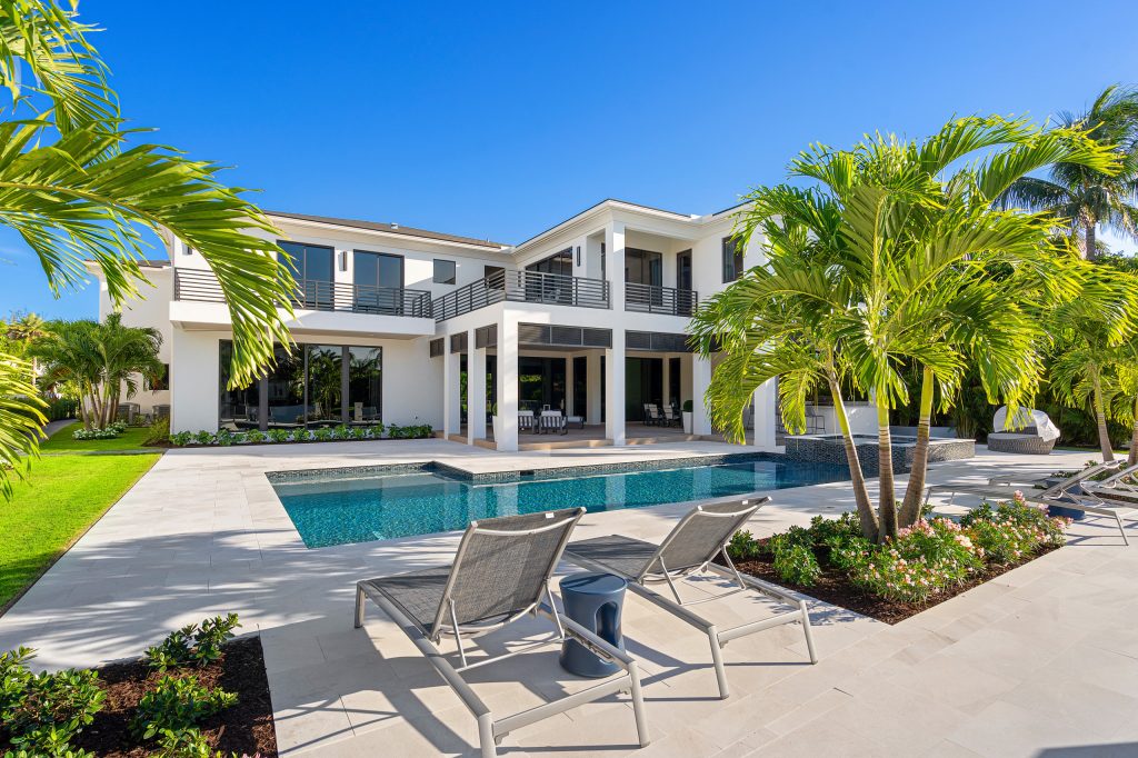 Covered outdoor living space, summer kitchen and pool.