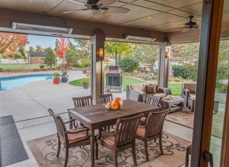 Covered patio addition with can lighting and ceiling fan