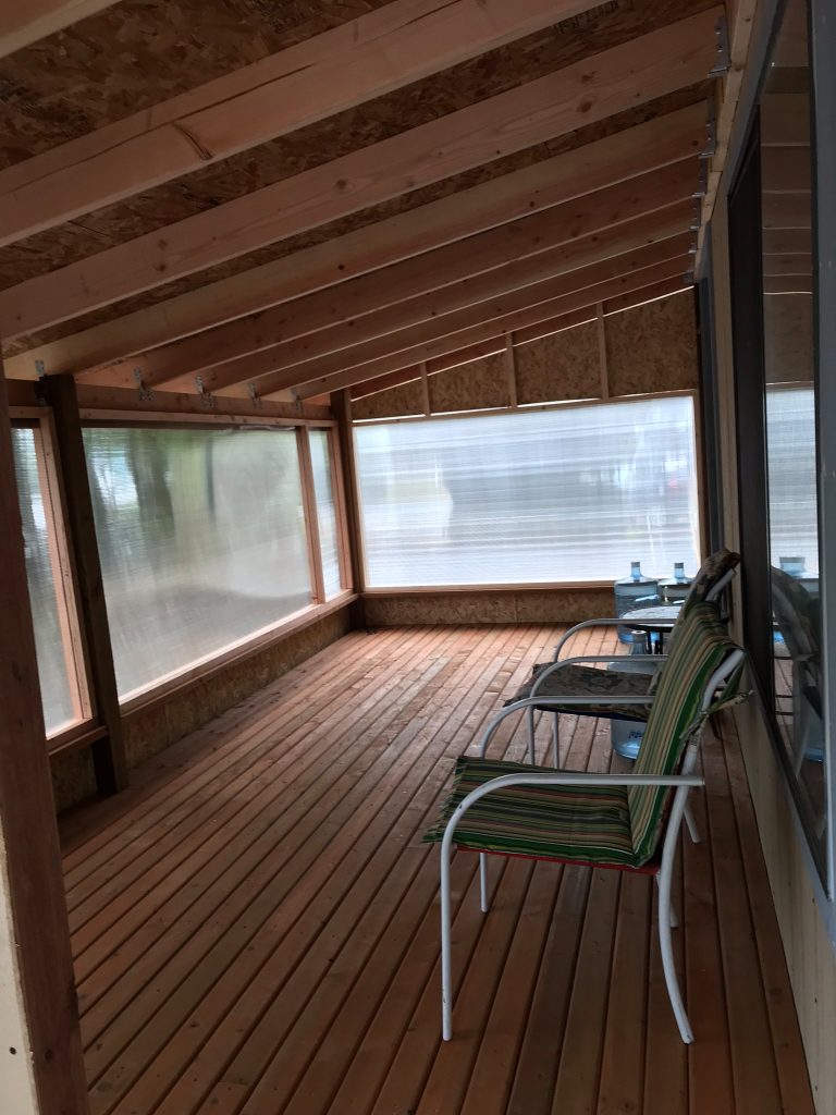 Covered porch and siding remodel