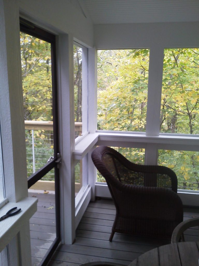 Custom interior handrail for screen porch