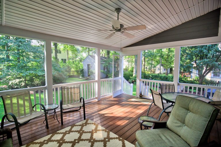 Custom screened in porch with custom ceiling, railings, stairs.