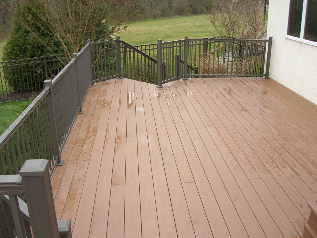 Deck after it was "redecked" with Azek vinyl decking and Keylink bronze aluminum railing