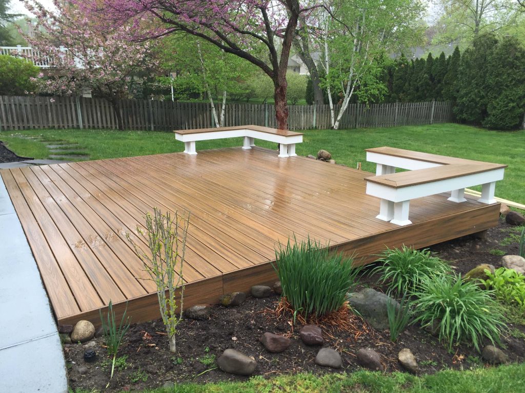 Deck - mid-sized modern backyard deck idea in New York with no cover