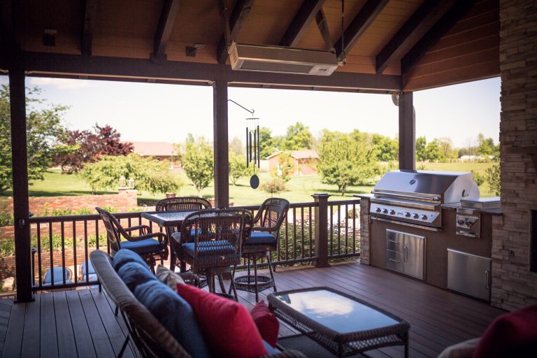 Deck restructure with roofs and outdoor kitchen. Photos by Jared Price Photography