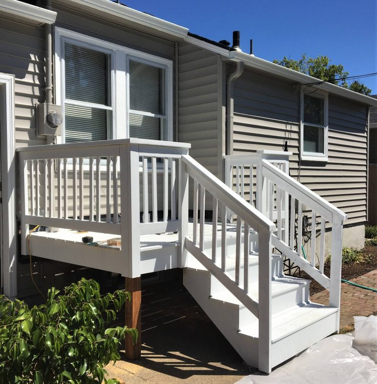 Demo and rebuild back porch and stair.