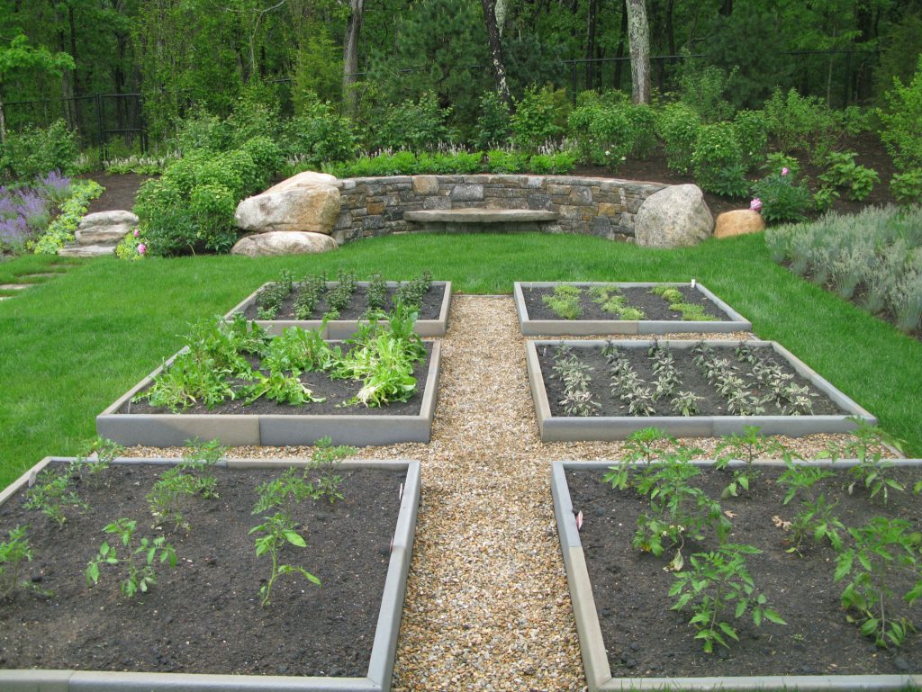 Design ideas for a large coastal full sun backyard gravel landscaping in Boston.