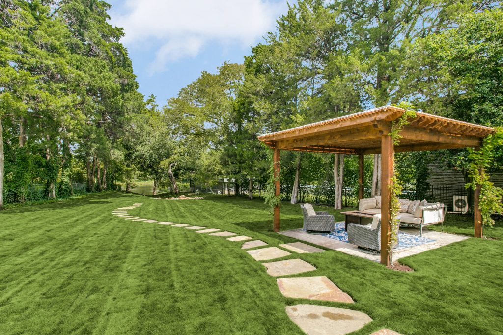Design ideas for a mediterranean backyard landscaping in Dallas with a pergola.