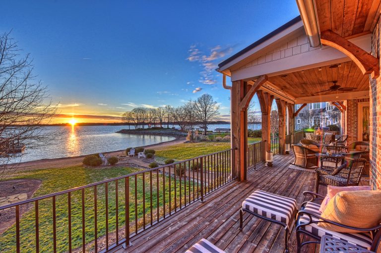 Designed by: Elite Design Group Builder: Jim Shalvoy Photography by: Matthew Benham Photography Real Estate Agent: Lori of Ivester Jackson Distinctive Properties by Elite Design Group | Outdoor Photos | Porch | Landscaping | Landscape Design | Outdoor Living Space | Porch Design Ideas | Outdoor Living Space Ideas | Backyard Design