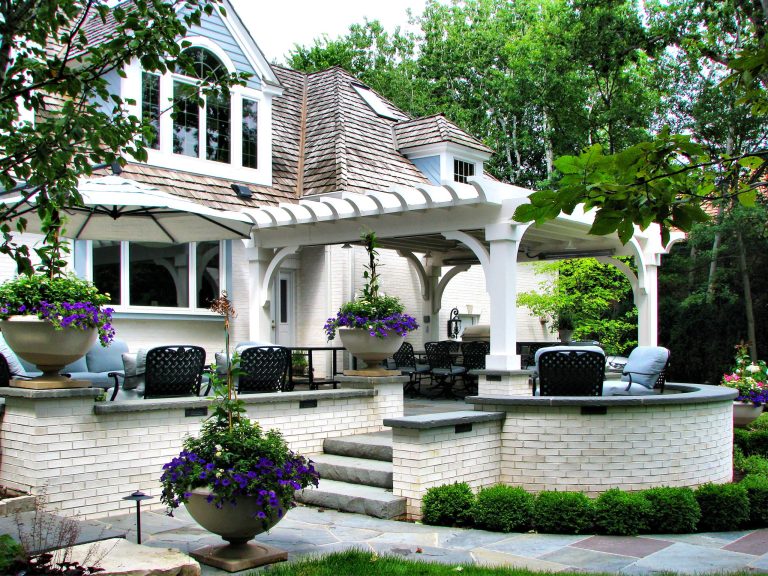 Designed by: Marco Romani, Landscape Architect. Outdoor Kitchen, Heated Pergola, Outdoor Lounge Room, Terraced Patio, Retaining Walls and Seatwalls, Landscape, Outdoor Seating Furniture.