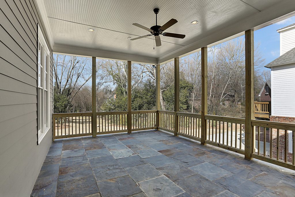 Dining porch off the main level perfect for outdoor entertaining.