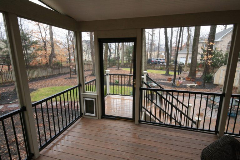 Dog door built into screen porch