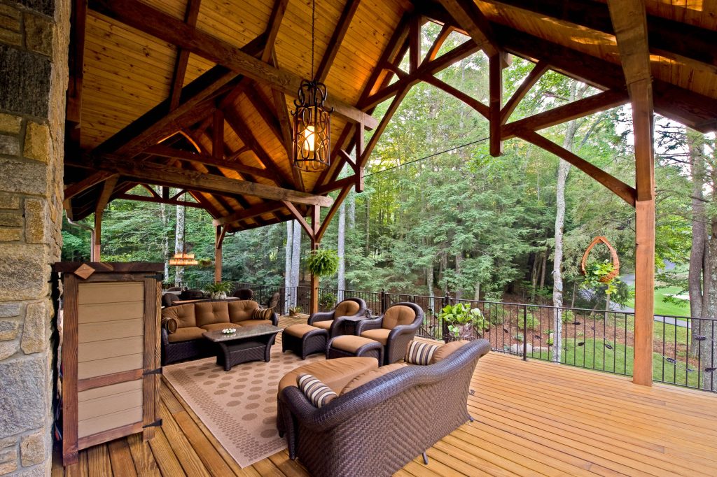 Douglas Fir covered timber frame porch. © Carolina Timberworks
