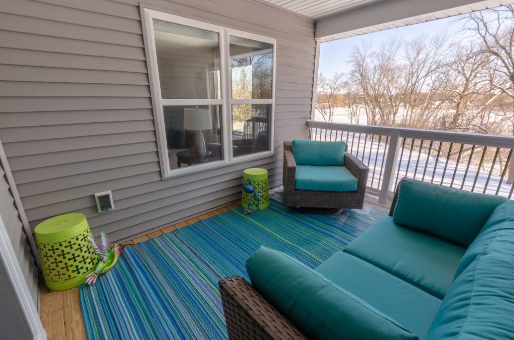 Elegant back porch photo in Milwaukee with decking by White Oak Builders, Inc. | Outdoor Photos | Porch | Landscaping | Landscape Design | Outdoor Living Space | Porch Design Ideas | Outdoor Living Space Ideas | Backyard Design