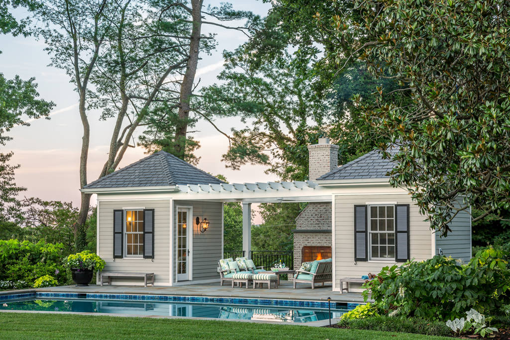 Elegant backyard rectangular lap pool house photo in DC Metro