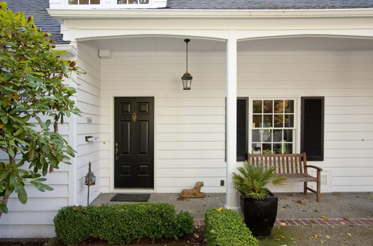 Elegant concrete porch photo in Portland with a roof extension by Sundeleaf Painting | Outdoor Photos | Porch | Landscaping | Landscape Design | Outdoor Living Space | Porch Design Ideas | Outdoor Living Space Ideas | Backyard Design