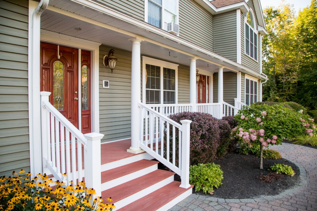 Elegant front porch photo in Portland Maine by Fortin Construction, Inc. | Outdoor Photos | Porch | Landscaping | Landscape Design | Outdoor Living Space | Porch Design Ideas | Outdoor Living Space Ideas | Backyard Design