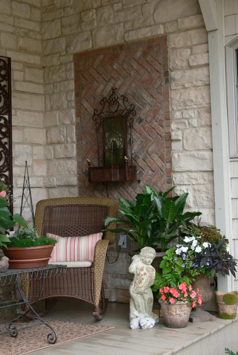 Elegant porch container garden photo in Cleveland by BARNES NURSERY & GARDEN CENTER | Outdoor Photos | Porch | Landscaping | Landscape Design | Outdoor Living Space | Porch Design Ideas | Outdoor Living Space Ideas | Backyard Design