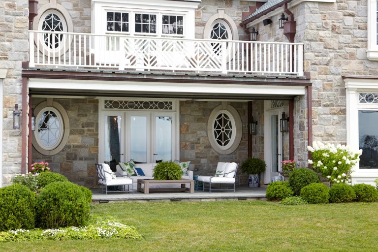 Elegant porch container garden photo in New York by JBMP Architecture and Interior Design | Outdoor Photos | Porch | Landscaping | Landscape Design | Outdoor Living Space | Porch Design Ideas | Outdoor Living Space Ideas | Backyard Design