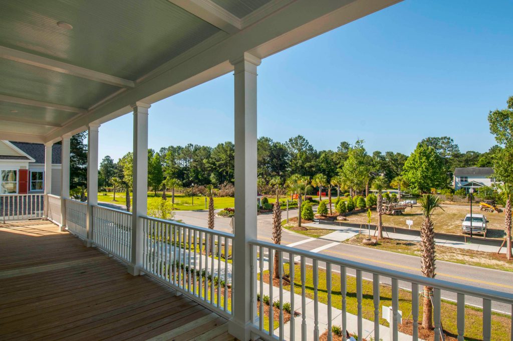 Elegant porch photo in Charleston by Carolina Fenestration Consultants | Outdoor Photos | Porch | Landscaping | Landscape Design | Outdoor Living Space | Porch Design Ideas | Outdoor Living Space Ideas | Backyard Design