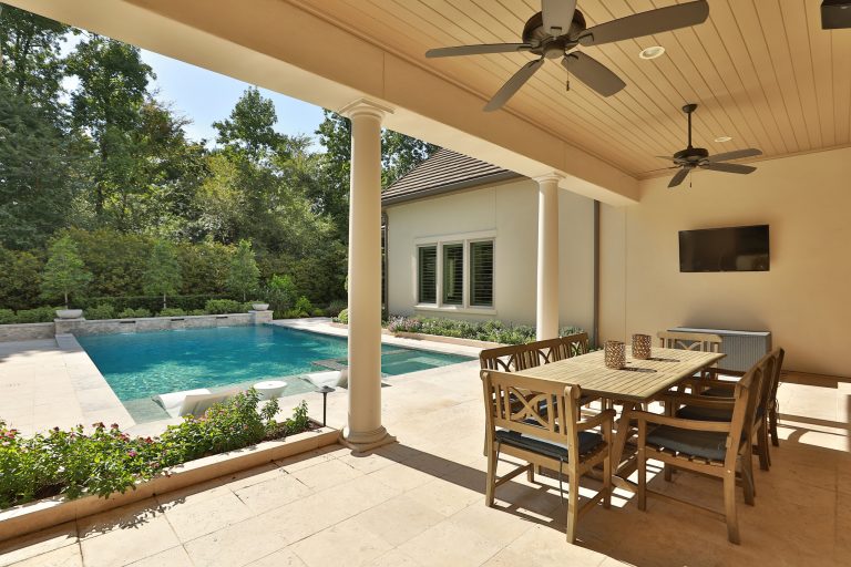 Elegant porch photo in Houston by At Home | Outdoor Photos | Porch | Landscaping | Landscape Design | Outdoor Living Space | Porch Design Ideas | Outdoor Living Space Ideas | Backyard Design