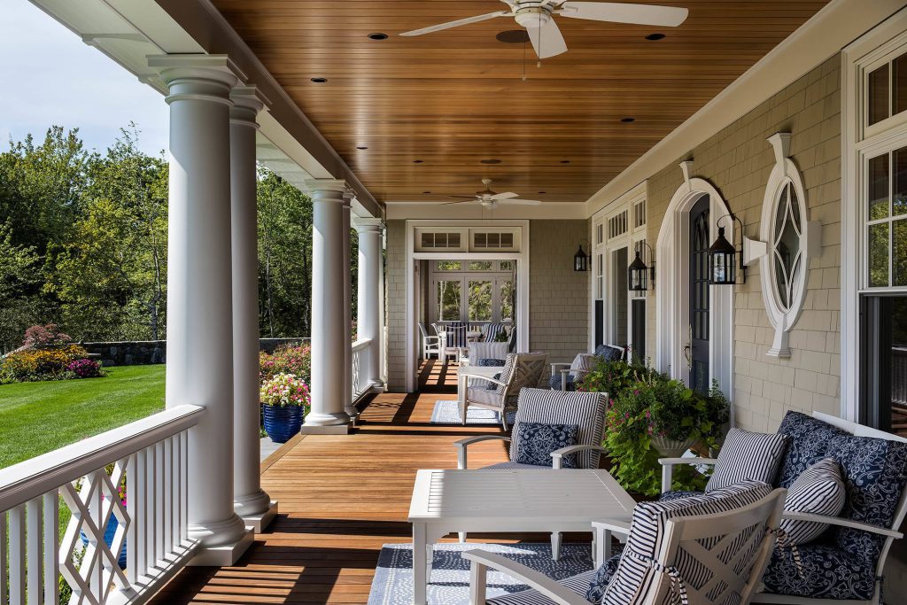 Elegant porch photo in Portland Maine with decking and a roof extension by Thomas & Lord | Outdoor Photos | Porch | Landscaping | Landscape Design | Outdoor Living Space | Porch Design Ideas | Outdoor Living Space Ideas | Backyard Design