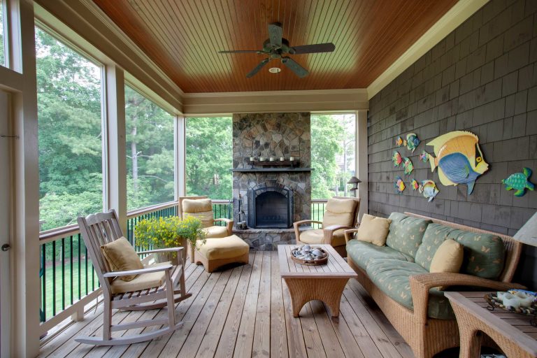 Elegant porch photo in Raleigh with a fire pit and decking by Tad Davis Photography | Outdoor Photos | Porch | Landscaping | Landscape Design | Outdoor Living Space | Porch Design Ideas | Outdoor Living Space Ideas | Backyard Design