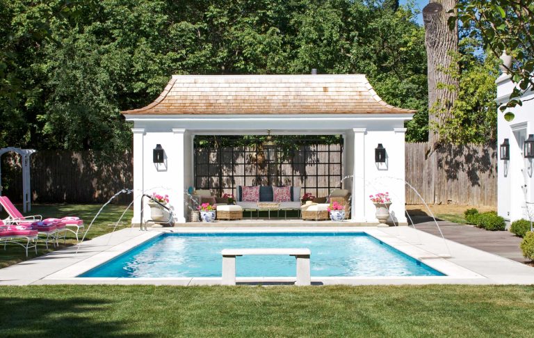 Elegant rectangular pool house photo in Chicago