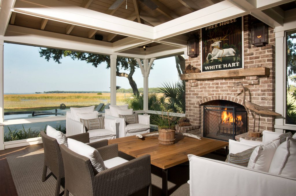 Elegant screened-in porch photo in Atlanta with a roof extension by Esposito Construction, Inc. | Outdoor Photos | Porch | Landscaping | Landscape Design | Outdoor Living Space | Porch Design Ideas | Outdoor Living Space Ideas | Backyard Design