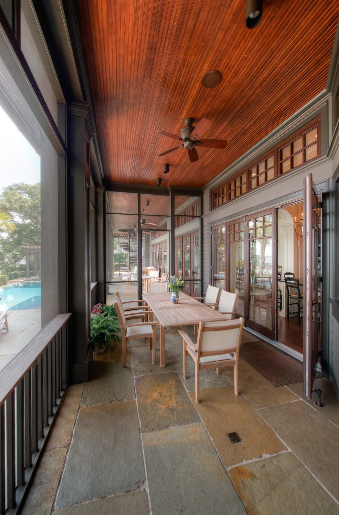 Elegant screened-in porch photo in Charleston with a roof extension by Solaris Inc. | Outdoor Photos | Porch | Landscaping | Landscape Design | Outdoor Living Space | Porch Design Ideas | Outdoor Living Space Ideas | Backyard Design