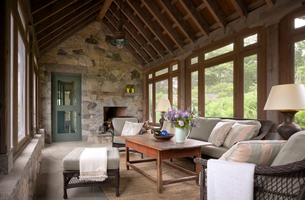 Elegant stone porch photo in Boston with a roof extension by Martha's Vineyard Construction Co., Inc. | Outdoor Photos | Porch | Landscaping | Landscape Design | Outdoor Living Space | Porch Design Ideas | Outdoor Living Space Ideas | Backyard Design