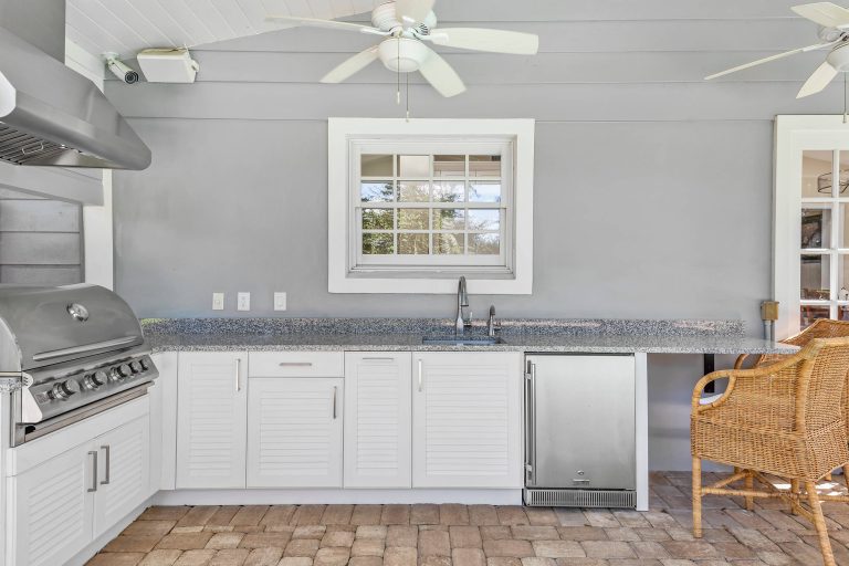 Enjoy Florida's year-round great weather with an outdoor kitchen on the back porch.