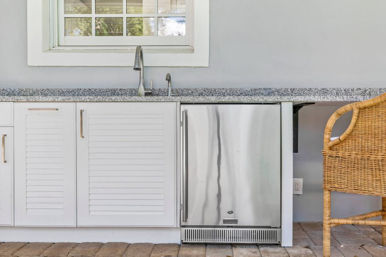 Enjoy Florida's year-round great weather with an outdoor kitchen on the back porch.